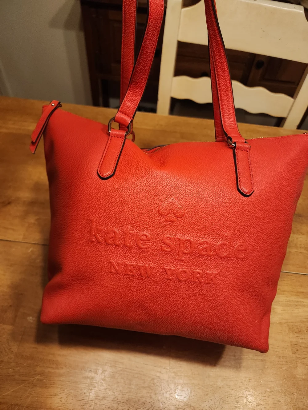 This Kate Spade Larchmont Avenue Logo Penny Tote in chili red